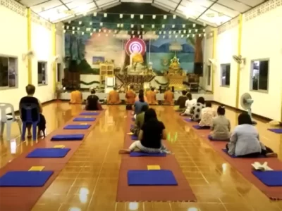 Wat Phanat Nikhom Chanting in community hall